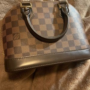 Louie Vuitton Alma BB crossbody bag